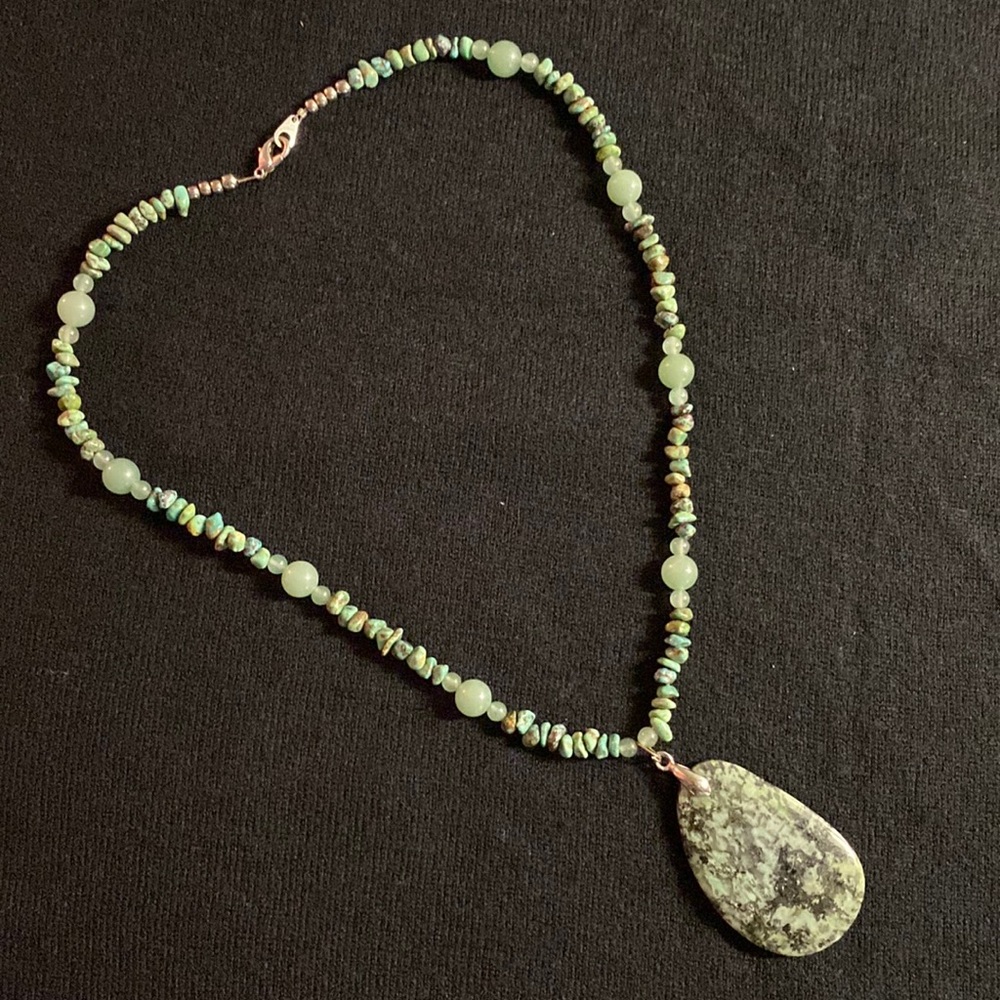 Minty jade green faux stone beaded necklace with polished stone pendant